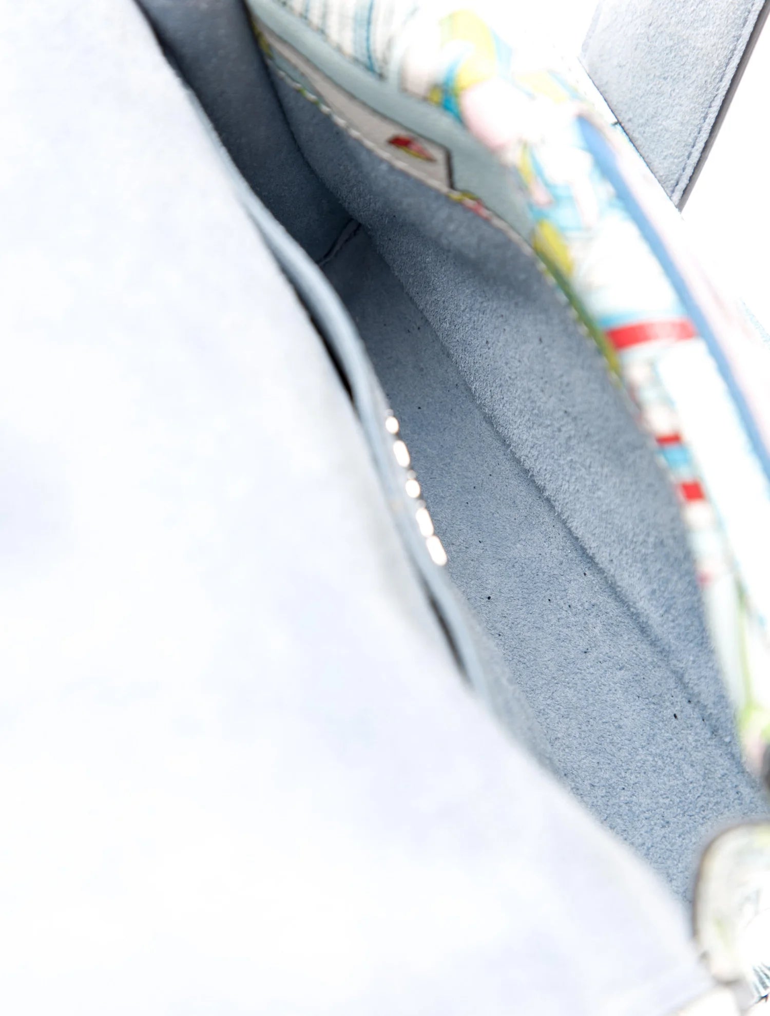 Authentic. Pre-owned. This item is FINAL SALE and is not returnable. Brand: Prada Material: Blue Glace Calf Leather Design: Prada Crossbody Bag Blue Glace Calf Leather Printed Silver-Tone Hardware Single Adjustable Shoulder Strap Suede Lining & Dual Interior Pockets Flap Closure at Front Includes Dust Bag